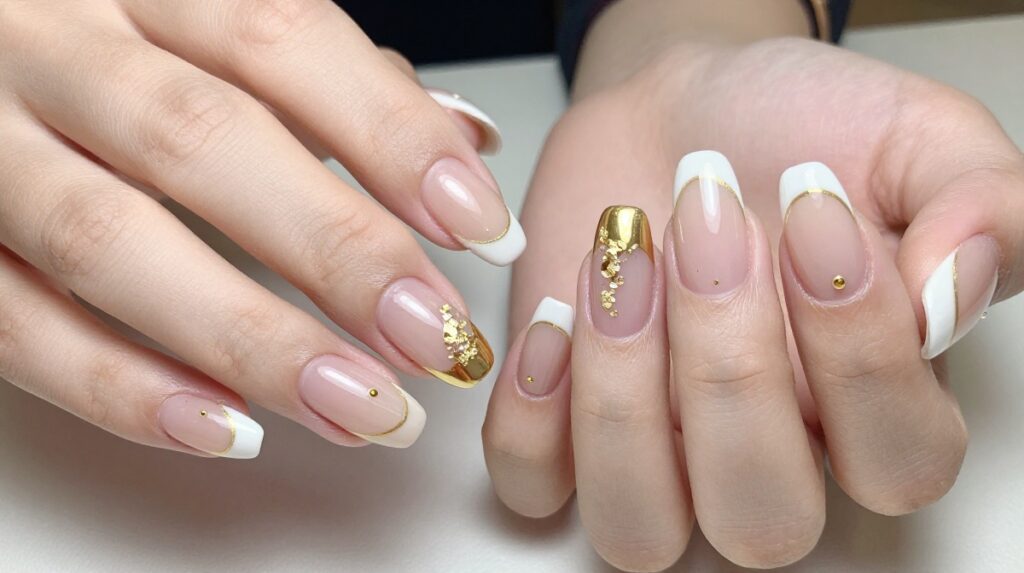 6. Gold Accent Nails